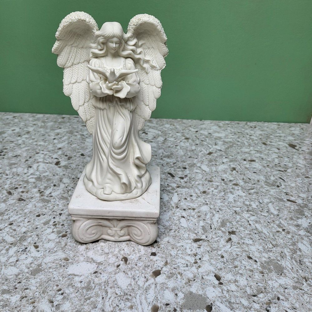 Elegant Angel on Pedestal